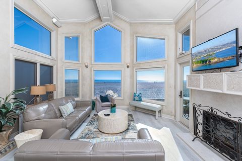 Our oceanfront vacation home is a relaxing and lush oasis, with artistically detailed furnishings, murals, etched glass, and comfort throughout.