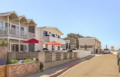 Enjoy ocean views from the oversized front patio, just steps from the beach