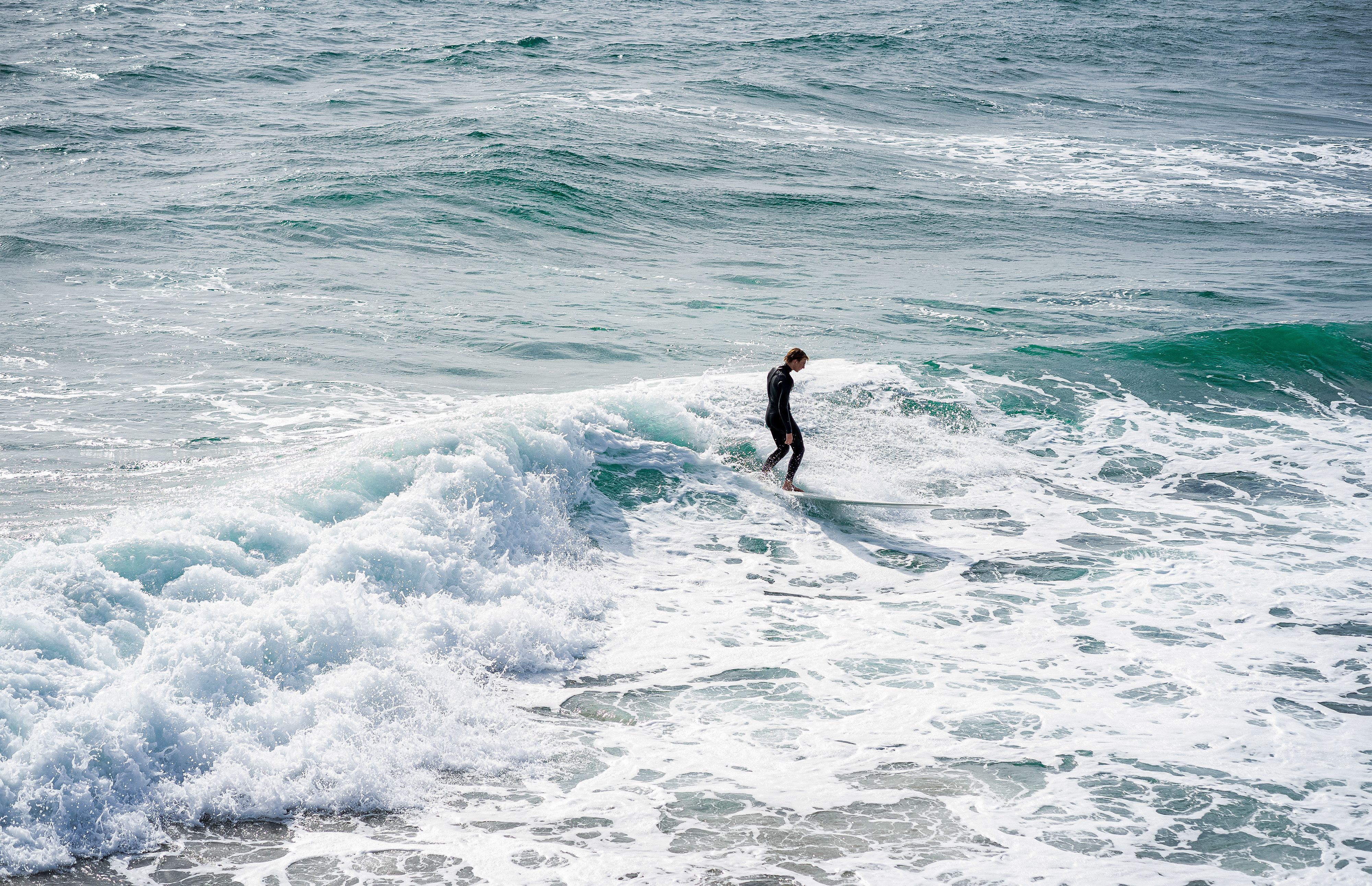 Ride the perfect wave along Newport’s iconic coast.
