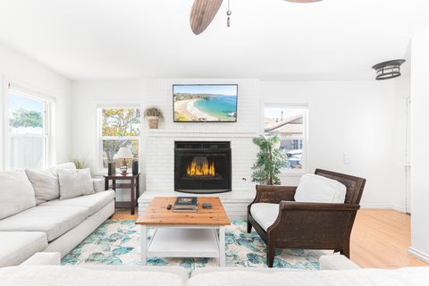 The main living area - located on the ground floor - is bright and cheery, perfect for unwinding after a day at the beach.