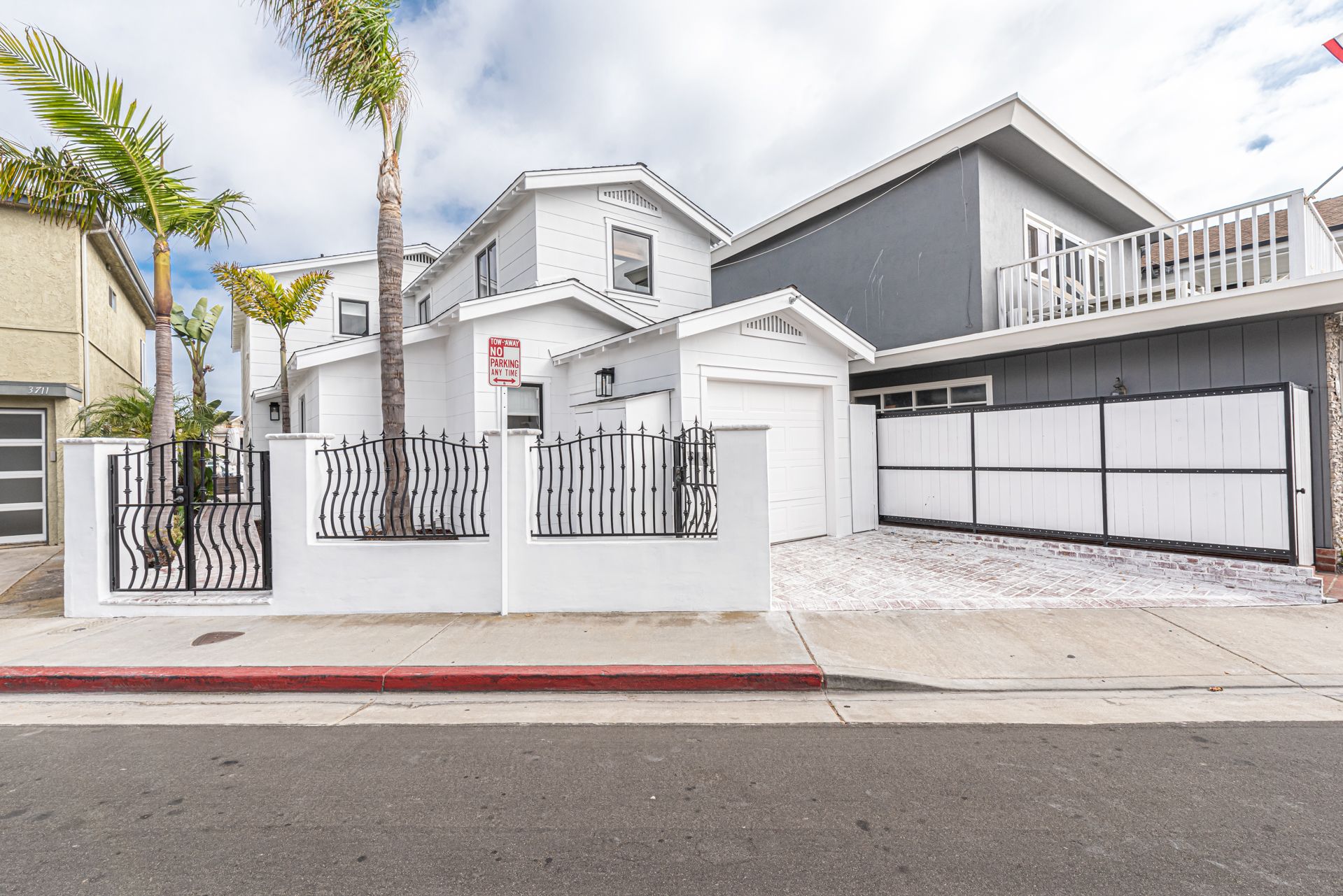 1 parking space is included in the one-car garage; parking in or across driveway prohibited due to blocking sidewalk. Note: Street parking on Newport Island requires a permit during the summer months. Do not park without a permit.
