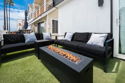 Relax outdoors with cozy lounge seating and a gas firepit perfect for evening gatherings
