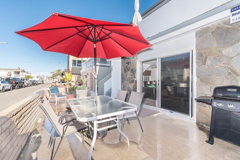 Ocean view from the front patio, 3 houses back from the 35th Street beachfront and boardwalk; includes outdoor dining, propane bbq grill, market umbrella.