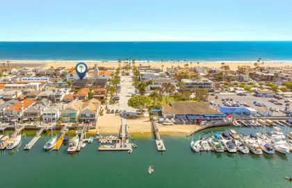 Aerial view highlighting your prime location between the bay and the beach on the Newport Peninsula