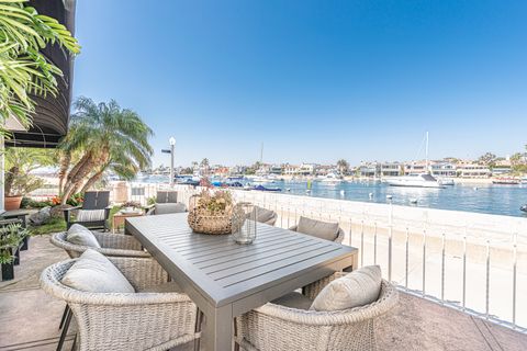 Welcome to your Balboa Island getaway. This two-story, single-family home sits right at the foot of the bay on a large corner lot, for a beautiful and restful retreat.