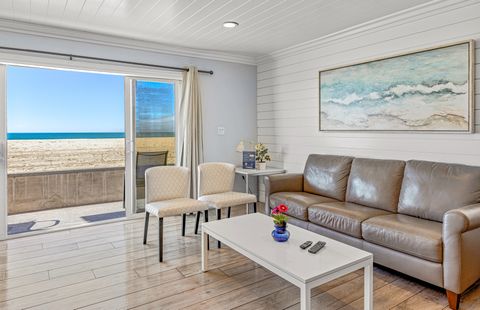 This split-level downstairs unit is a beautifully appointed, stylish property in a terrific location at 34th Street beach!