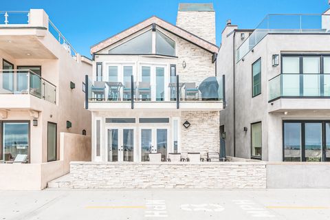 The exterior of this two-level vacation home with plenty of outdoor and indoor space for the whole group. There's even a propane BBQ grill for evening cookouts!
