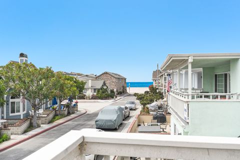 View from the front patio. Patio includes propane BBQ grill, outdoor seating for 4, and market umbrella.