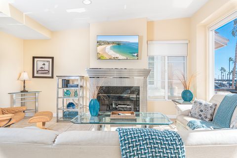 Bright and cheery, the interior is outfitted with beachy details for the perfect coastal getaway.
