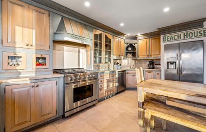 The kitchen comes stocked with dishes, utensils, cookware, bakeware, and all major and small appliances.