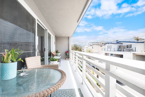 The front balcony deck includes a grill and pull-down shade, perfect for evening cook outs.