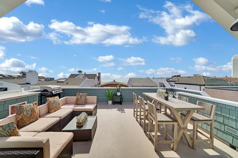 There's not one but two rooftop decks on the third level of this home. This is the Oceanview deck, with ample outdoor seating and a propane gas BBQ grill.