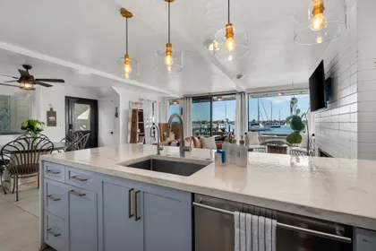 Open-concept kitchen and living area designed for effortless bayfront gatherings