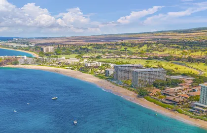 Stroll the miles of beach walk that line Kaʻanapali Beach