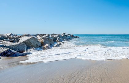 Stay along a peaceful stretch of the coast where local favorites, sandy beaches, and laid-back charm meet.