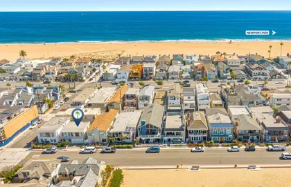 Aerial view showcasing the home’s prime Newport Beach location just steps from the sand