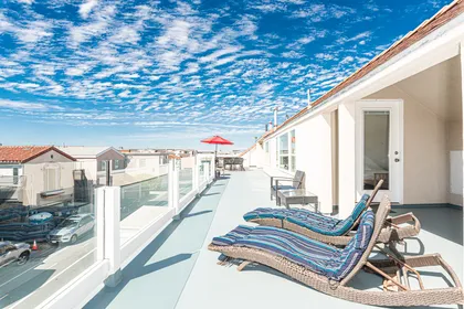 Panoramic views, including peek-a-boos of the ocean on the large third level deck
