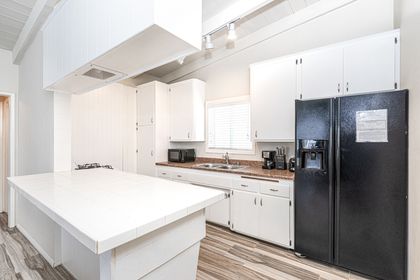 The kitchen opens up to the living area, for easy group hangouts.