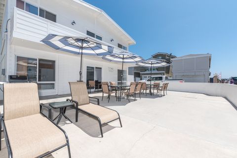 Unwind on the largest patio on Seashore Drive! There's no better home base for families to enjoy the sights and delights of Newport Beach.