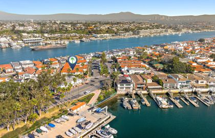 Stunning aerial view showcasing the home’s prime location in Lido Island, with easy access to coastal waterways and local hotspots