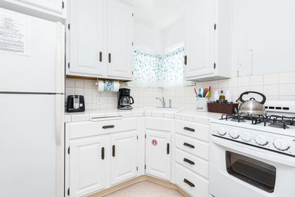 The kitchen comes stocked with dishes, utensils, cookware, bakeware, and large/small appliances.
