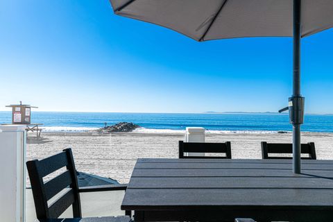 Oceanfront balcony with unobstructed views of iconic 48th Street Beach, your private front-row seat to the Pacific