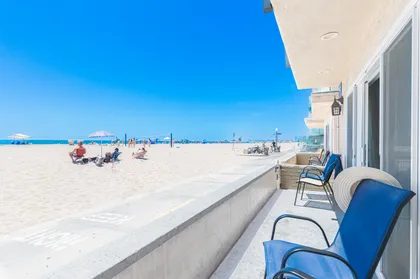 Enjoy evening cookouts on the front patio after a day at the beach.