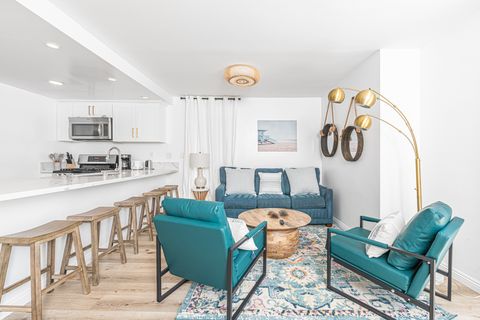 Newly renovated with style & comfort in mind, this downstairs beach home will sweep you off your feet and into vacation mode!