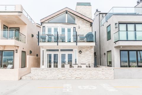 The exterior of this two-level vacation home with plenty of outdoor and indoor space for the whole group. There's even a propane BBQ grill for evening cookouts!