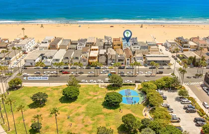 Perfectly positioned between park and shoreline, this coveted beachside setting offers effortless access to sand and surf