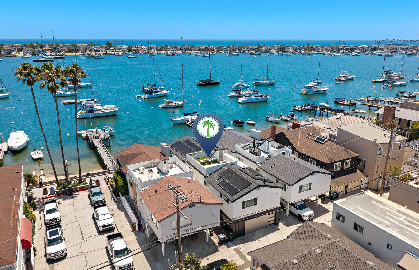 Front-row views of Newport Harbor from this coveted bayfront location