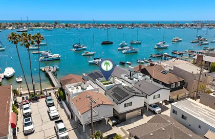 Front-row views of Newport Harbor from this coveted bayfront location