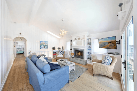 The magic is in the details! This beach home is bright and cheery, but also cozy and snug. Open the patio doors for an ocean breeze, or turn on the fire and TV for a comfy night in.