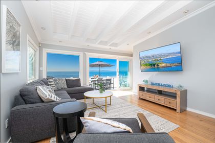 The living space is bright, coastal, and serene, where panoramic ocean views become the backdrop to every moment