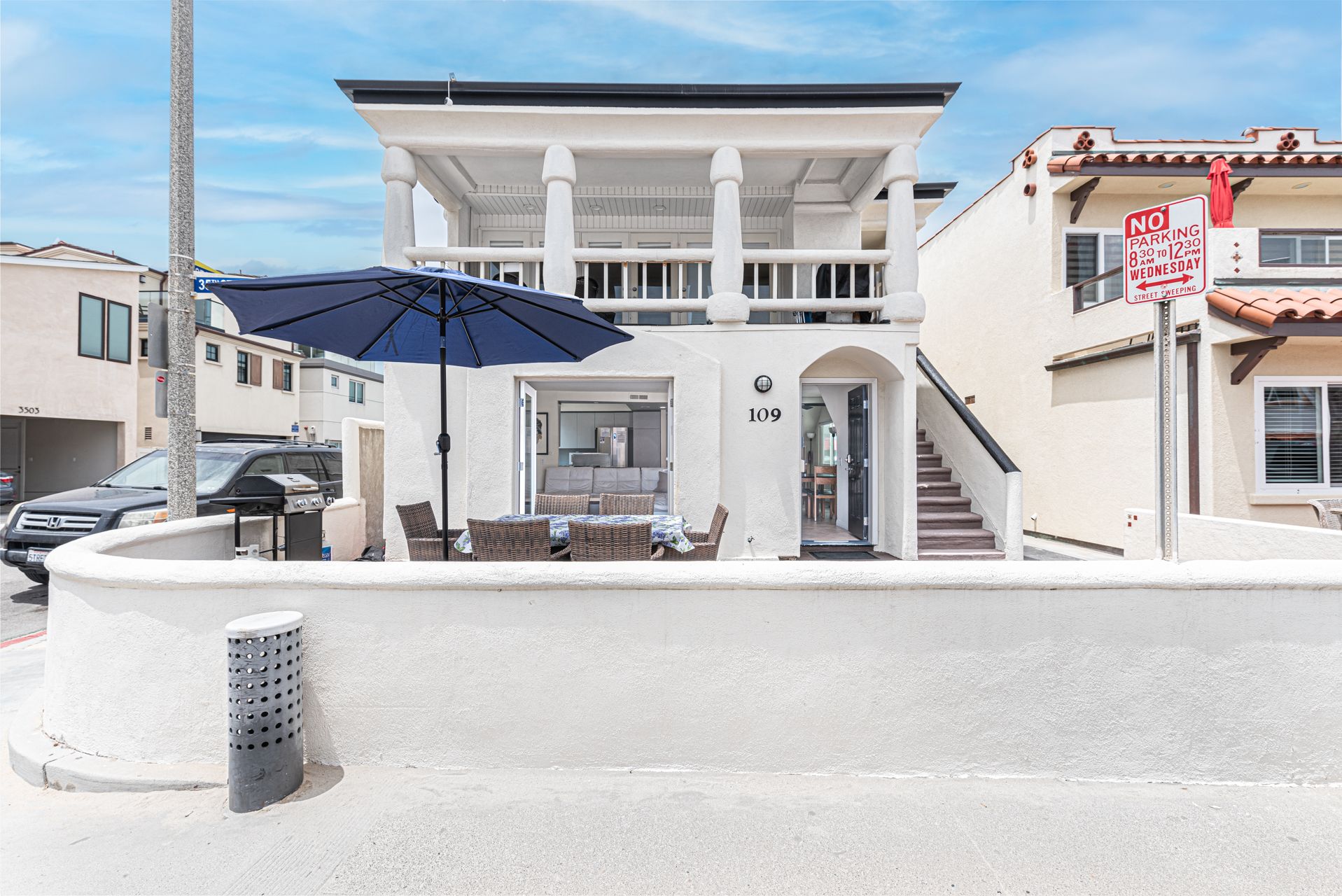 35th Street view of the entire corner, ocean view duplex. This listing information only pertains to the downstairs 3 bd/3 ba unit. The upper 4 bd/2 ba unit can also be rented when available. See separate listing.