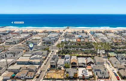 Aerial view showcasing your ideal Newport Beach location with the ocean just steps away