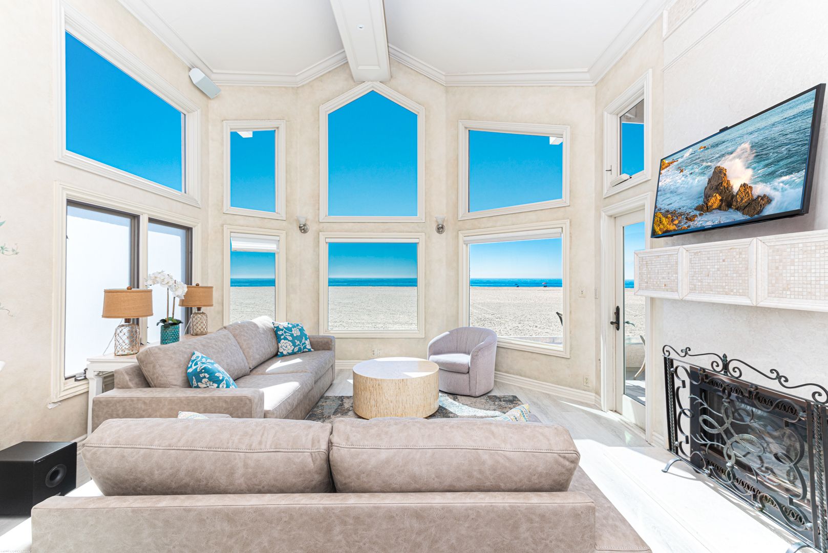 Our oceanfront vacation home is a relaxing and lush oasis, with artistically detailed furnishings, murals, etched glass, and comfort throughout.