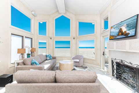 Our oceanfront vacation home is a relaxing and lush oasis, with artistically detailed furnishings, murals, etched glass, and comfort throughout.