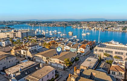 Aerial view of the property, perfectly flanked by the bay.