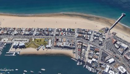 Aerial view of the property - one house from the sand and one street from the bay!