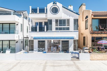 Front exterior of the home, which is optimally situated between the Newport and Balboa Piers.