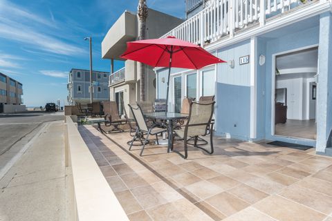 Ocean view from the coveted 34th Street front patio, two houses back from beachfront and boardwalk; includes outdoor dining, propane bbq grill, market umbrella.