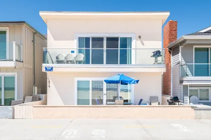 This oceanfront home is located on the first floor of the property, with a great front patio that is perfect for grilling, sunning, and people-watching!
