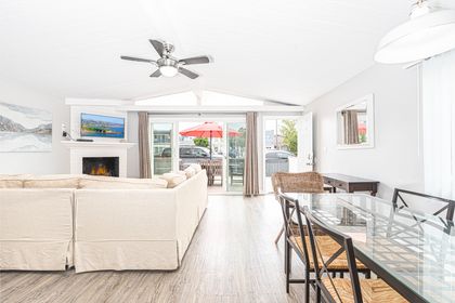 The main living area opens up to the spacious patio and boulevard beyond, for the perfect indoor/outdoor living experience.