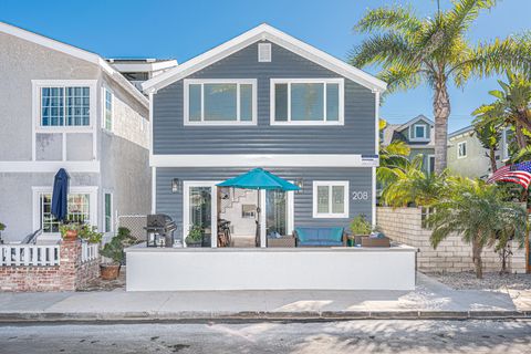 This bright and cheery vacation home is located just 11 homes from the sand. Ditch the car keys and explore the best of Newport on foot!