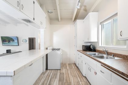 Kitchen comes stocked with all meal prep gear. Large and small appliances included (but no dishwasher). Guests must provide food and condiments.