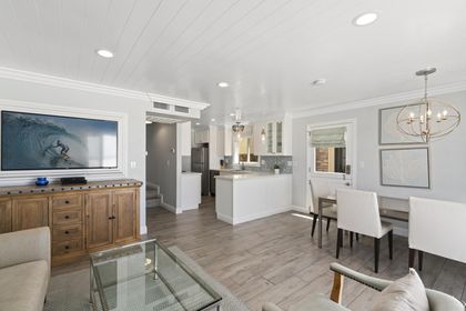 White wood “shiplap” covered walls, wide plank flooring, with custom tiling and lighting throughout - all complemented by airy, natural-toned furniture; the interior design will not disappoint.