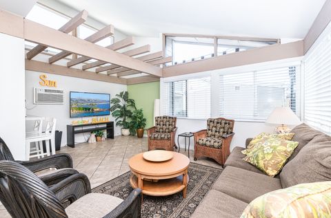 This vintage split-level unit is sun-filled and accommodating with everything you need for your next family vacation!