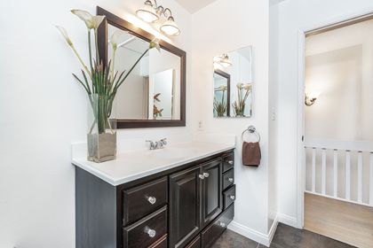 Upstairs bathroom located near master bedroom. Includes a tub/shower combo.