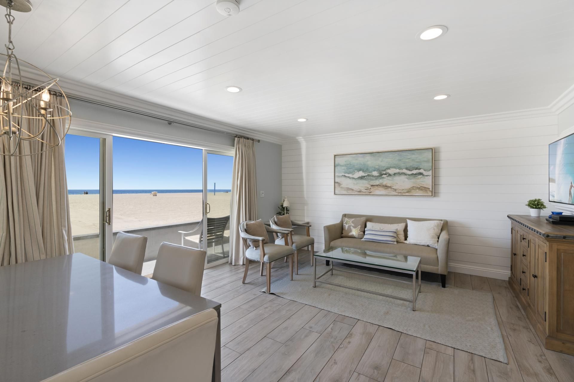 This split-level downstairs unit is a beautifully appointed, stylish property in a terrific location at 34th Street beach!